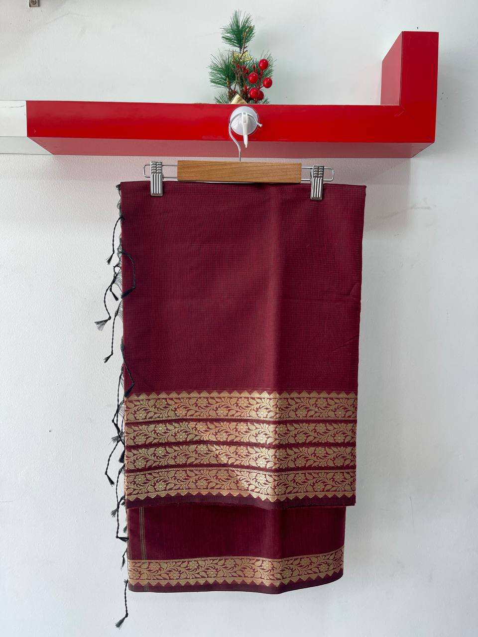 Maroon soft silk saree with gold zari border
