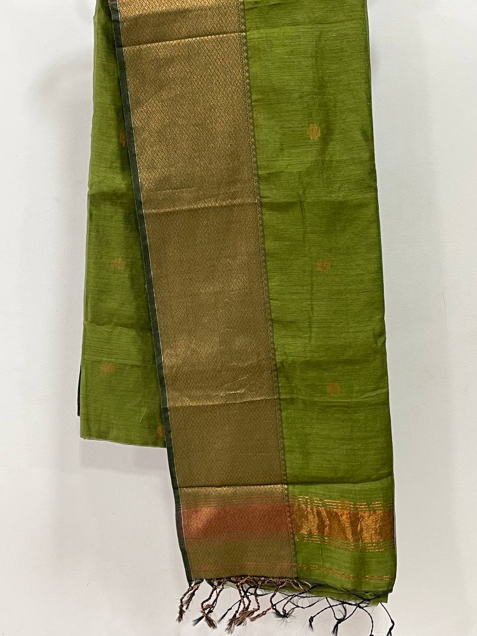 Green and brown striped fabric with a white background