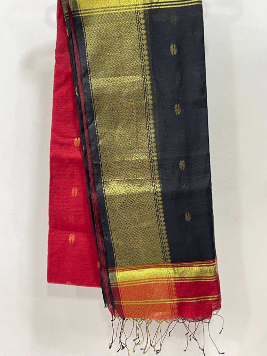 Traditional saree with a red, green, and black pattern on a white background