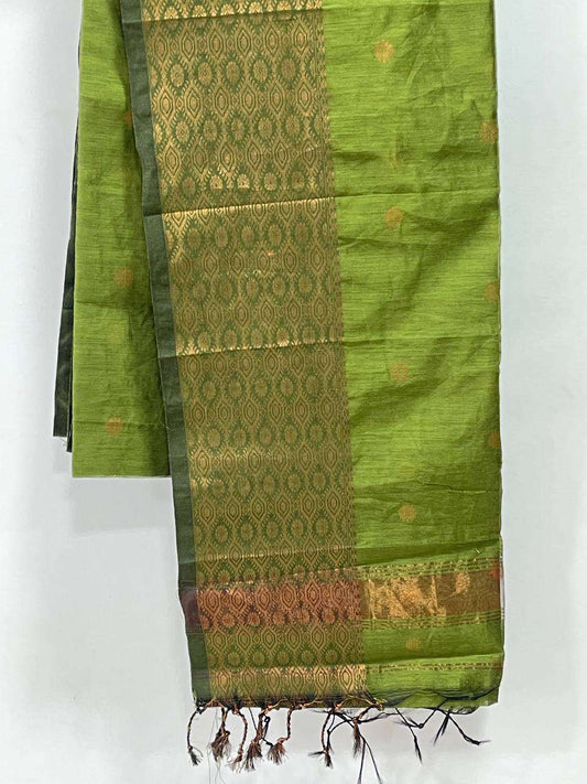 Green saree with gold patterns on a white background