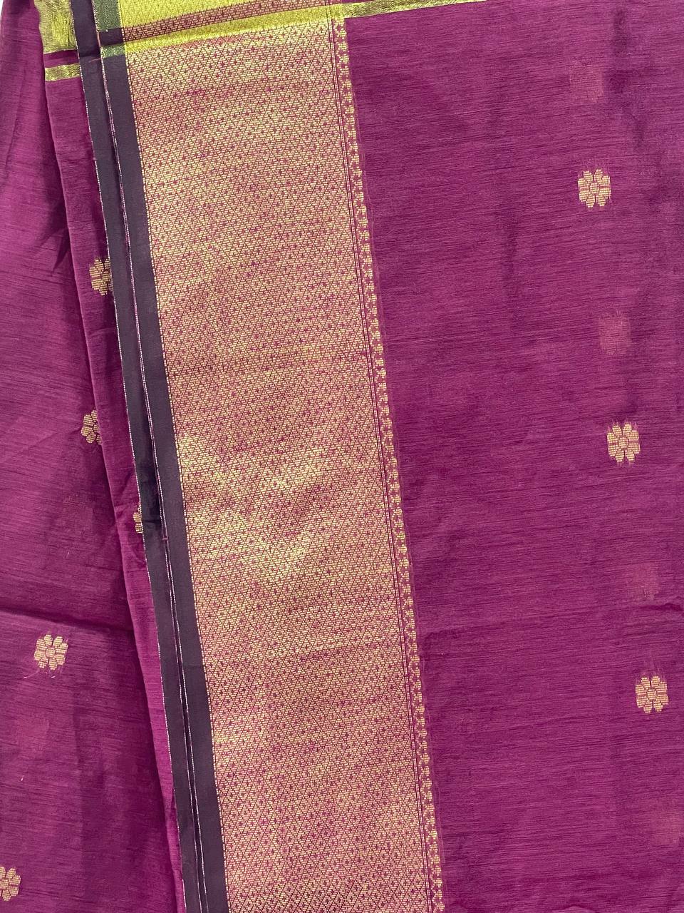 Purple fabric with gold border and floral patterns
