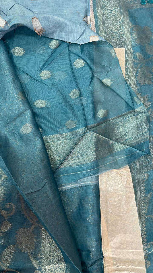 Blue semi Banarasi silk saree with silver zari floral motifs and border detail