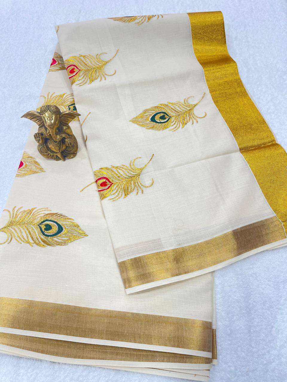 Set Saree with Peacock Feather Patterns (Mayilpeeli) Embroidery with Golden Border