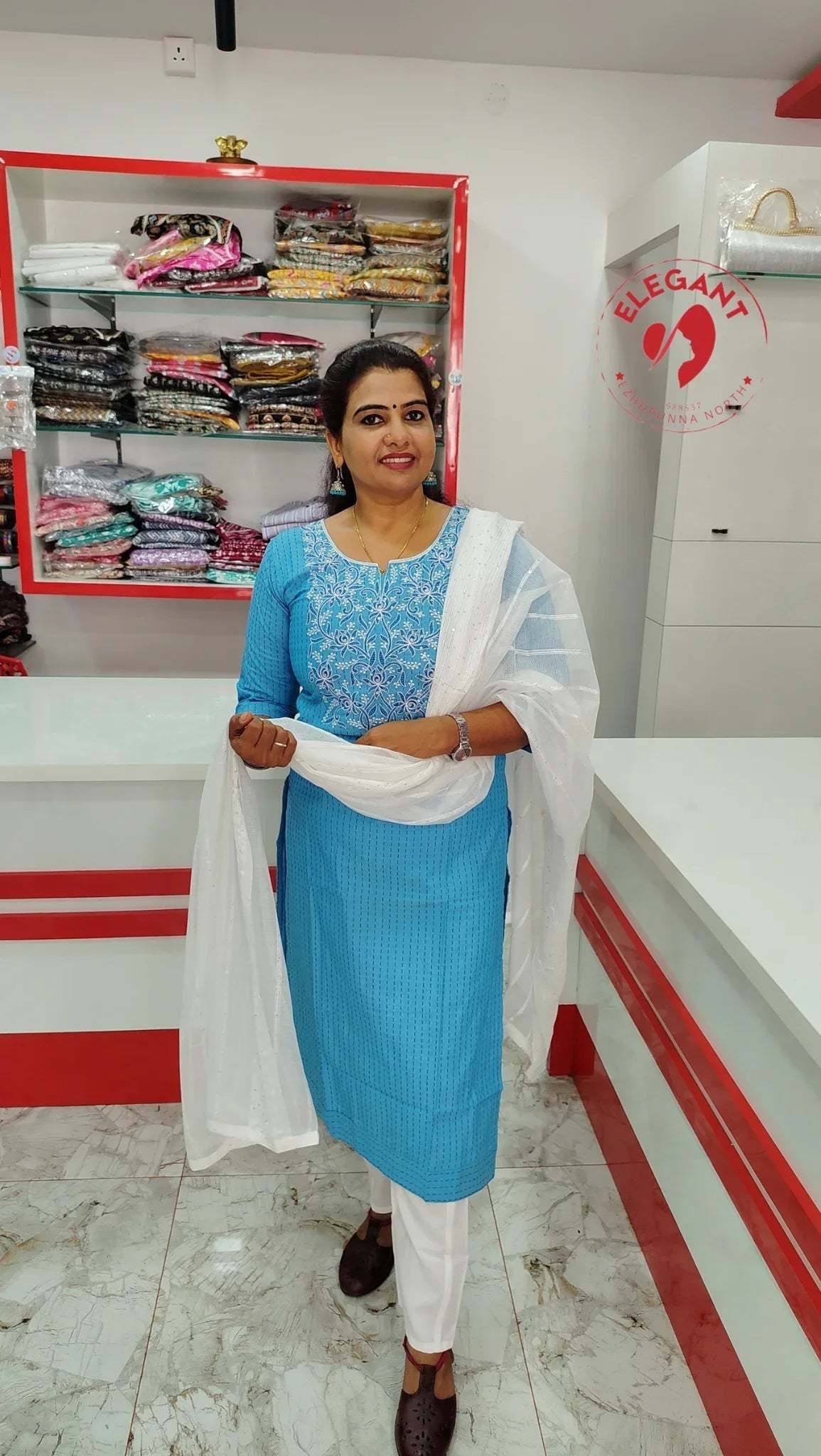 Blue silk churidar set with white dupatta, suitable for occasion wear and daily office use