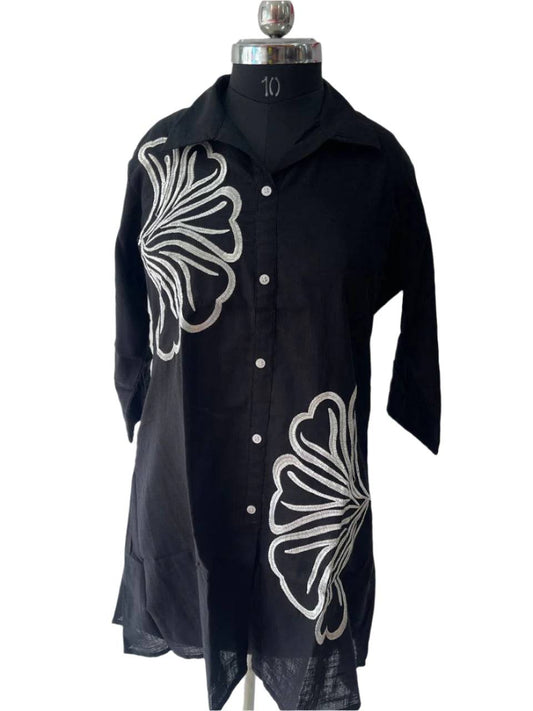 Black top with white embroidery works