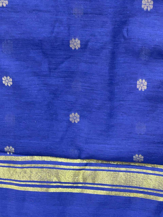 Blue fabric with white floral patterns and a gold border