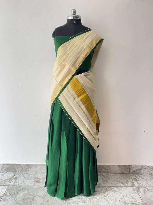 Tissue dhavani set featuring a green skirt and cream dupatta with gold zari borders on a mannequin against a white background